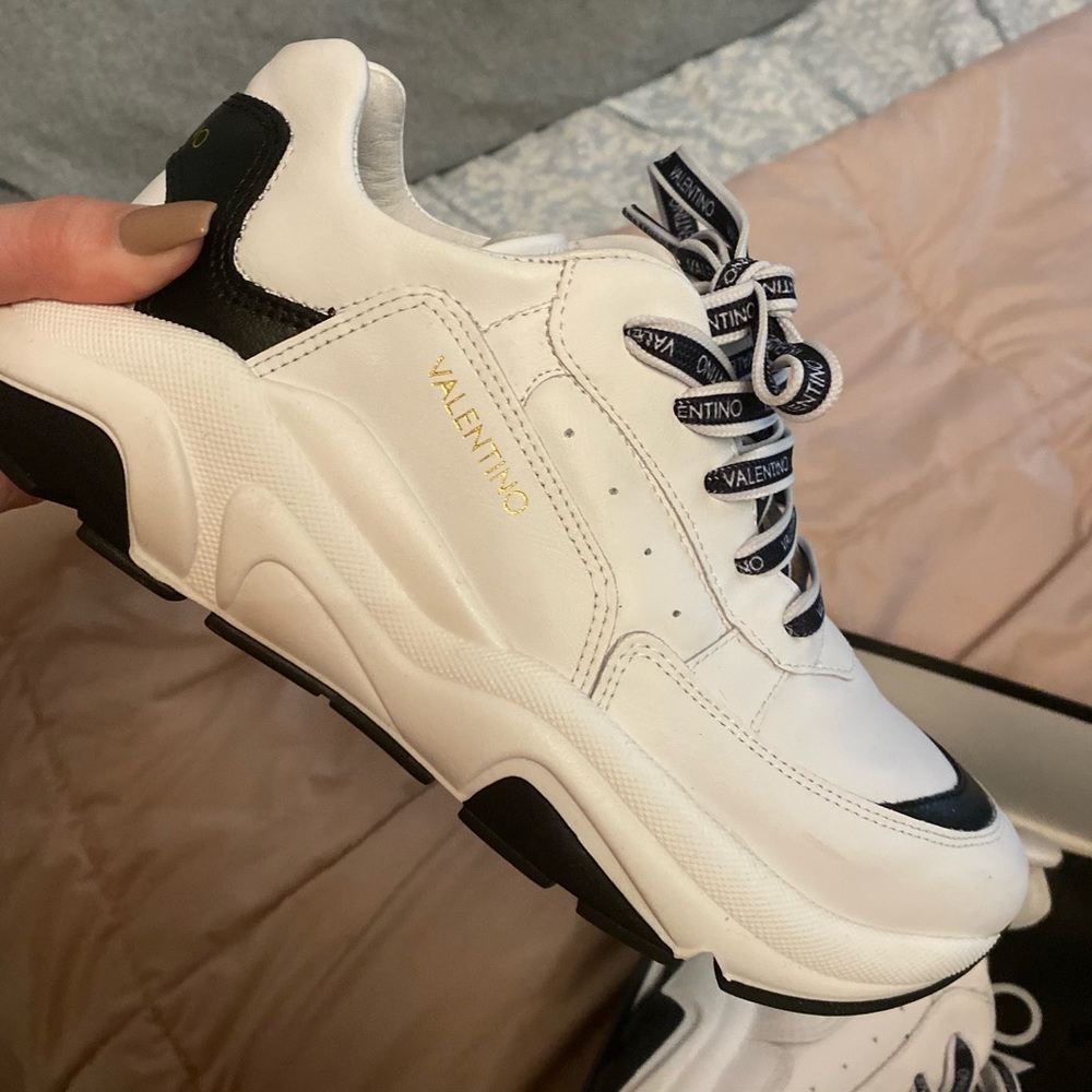 Valentino sneakers worn once like new conditions women size 10